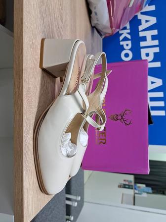 Продам новые босоножки