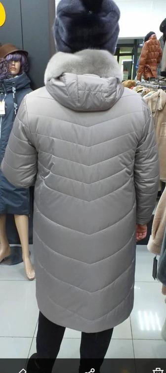 Продам куртку зимнюю размер 52 на верблюжке ,есть капюшон с норкой