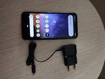 Сотовый телефон Нокиа.