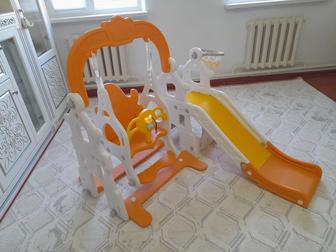 Детская горка с качелей.