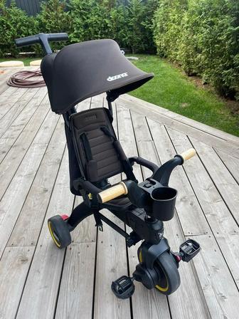 Трехколесный велосипед (5в1) Doona Like Trike S5 черного цвета.