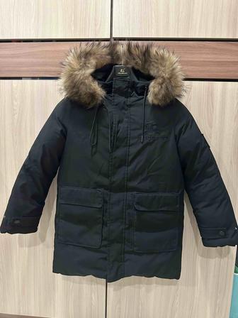 Продам зимнюю куртку на мальчика 7-8-9 лет