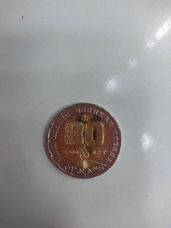 Продам монету 200 тг