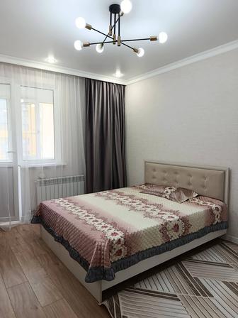 Продам двуспальную кровать с ортопедическим матрасом.
