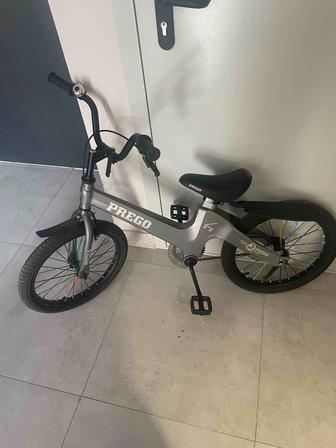 Продам велосипед Prego. Маленькие колесики по бокам имеются.