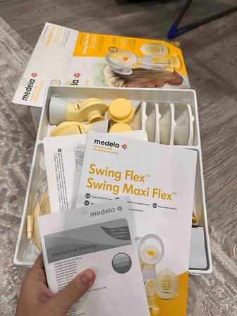 Электрический молокоотсос