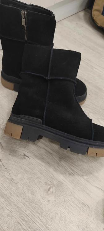 Продам новые сапоги