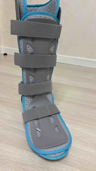 регулируемый фиксатор для голеностопного сустава