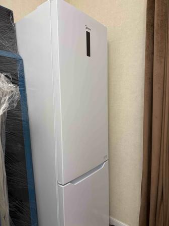 Продам холодильник новый Midea