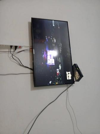 Телевизор и приставка