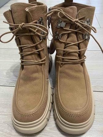 Продам новые зимние сапоги