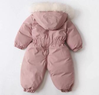 Продам новый зимний комбинезон для девочки (розовый)
