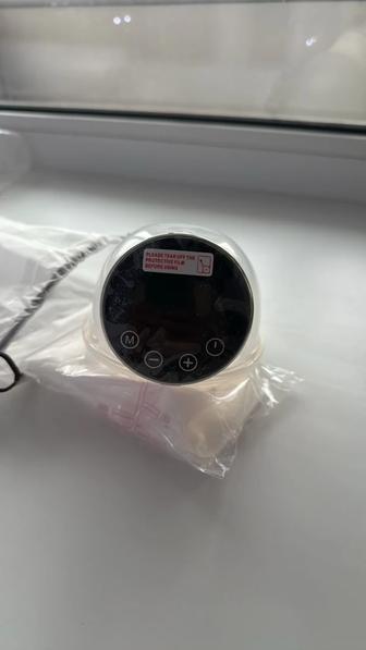 Электрический молокоотсос