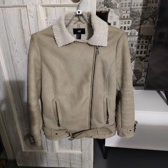 Продам женскую теплую куртку 48 размера