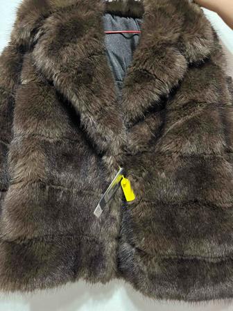 Продам эко/ шубку 46 р новое цвет коричневый