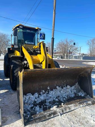 Услуги погрузчика,уборка снега, чистка мусора и/ тд