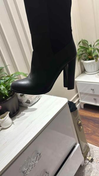 Сапоги на каблуке