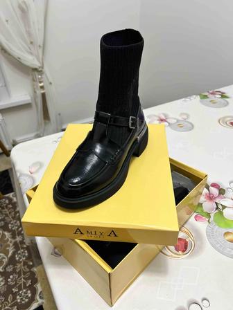 Продаю новые сапоги