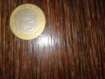 Продам 100 тенге брак(смещение центра) 2002 г.