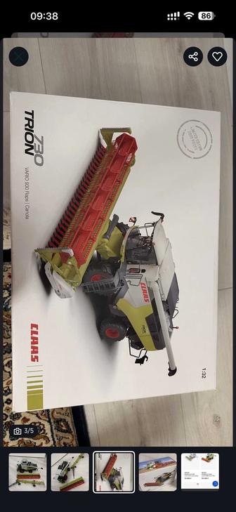 Продам игрушечный комбайн