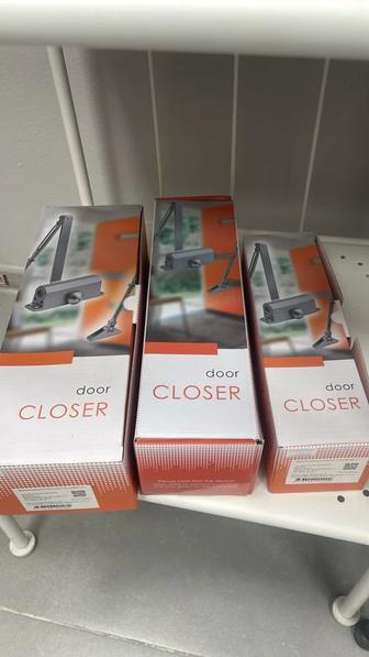 Дверные доводчики