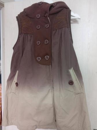 Продам жилетку теплую