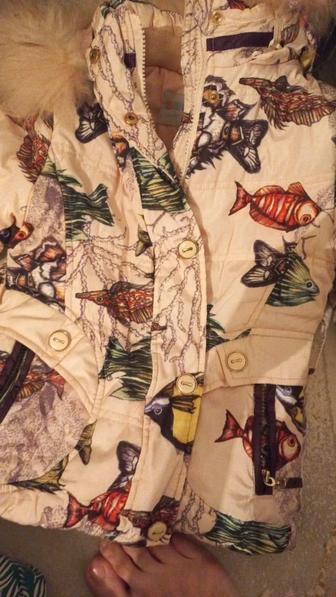 Продам детский комбинезон Вilemi