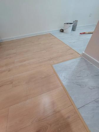 Установка плинтусов Укладка Ламината